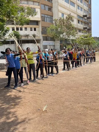 A full line of archers shooting together during our Drona Cup event. The sense of community is strong when everyone is aiming for the same goal.