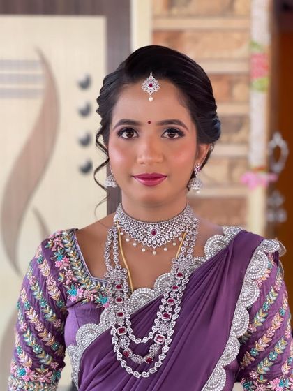 A portrait of Nayan, showcasing her stunning diamond jewellery and the soft, silvery-purple eye makeup I created to match her outfit.