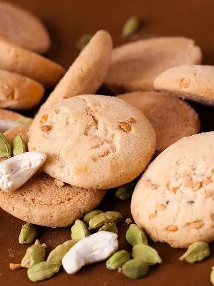 These are the legendary Dotivala Nankhatai biscuits from Surat. They are light, crumbly, and have a delicate cardamom flavour that simply melts in your mouth.