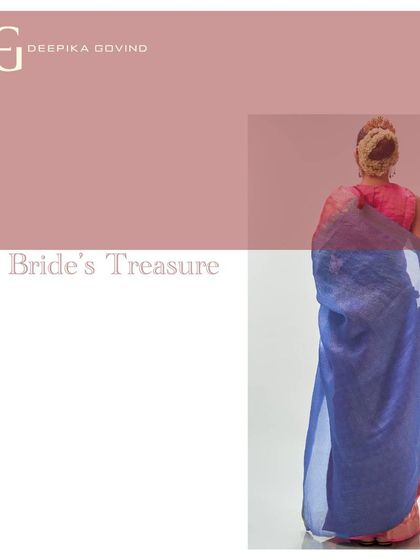 The back view of the 'Absolute Coral' saree, emphasizing the dramatic and beautiful contrast between the body and the pallu.