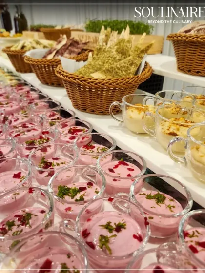 A colourful array of dips and breads, including beetroot raita and herbed lavash. Our spreads are designed to offer a variety of flavours and textures.