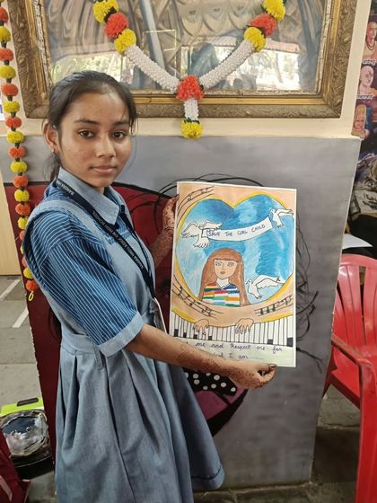 A student from the Bandra Hindu Association School with her beautiful colored drawing about peace and music. It is a privilege to provide these students with an opportunity to explore their creativity.