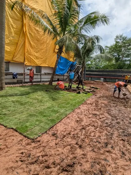 This image shows the scale of our 9,000 sq. ft. lawn project. Despite the wet soil from recent rains, we made significant progress in just two days.