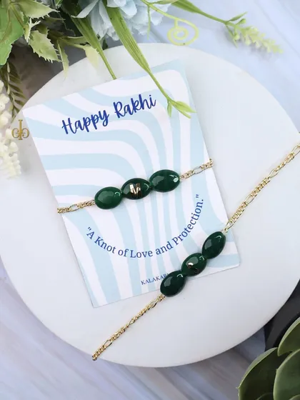 Our personalized Quartz Rakhi in a deep forest green color.