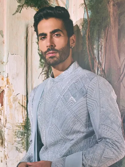 This close-up reveals the artistry I look for in menswear. The textured layers and serene tones of this ensemble are defined by quiet sophistication and timeless tailoring. It’s about feeling confident in pieces that are both well-made and effortlessly stylish.