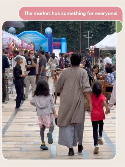 A mother and her two daughters enjoying a walk through the market. I aim to create a spacious and welcoming environment where families can comfortably explore at their own pace.