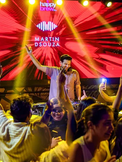 I balance the night between karaoke sets and straight-up dance music. This shot captures that moment where I switch gears to keep the dance floor full and the energy high.