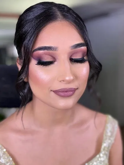 The same soft glam look with eyes closed to showcase the seamless eyeshadow blending. This technique creates depth and definition while maintaining a soft and romantic feel.