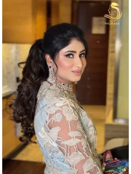 My client looking absolutely stunning with her high-volume, textured ponytail.