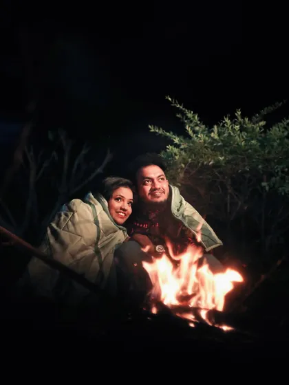 A cozy and unique pre-wedding photo by a campfire at night. I am always open to creative ideas to make your shoot one of a kind.