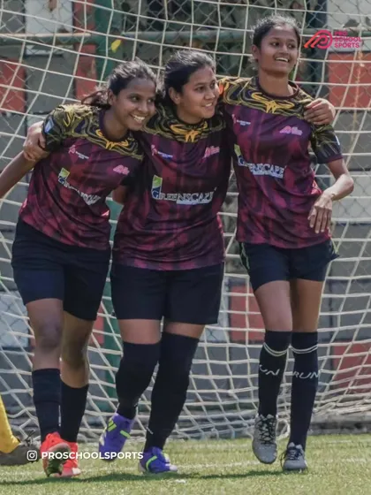 Three of our female players celebrating a moment together on the field. The smiles say it all.