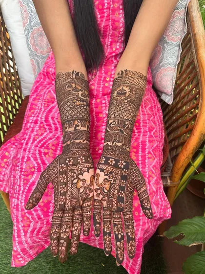 A clear, symmetrical view of the elephant motif design, showcasing the precision and care taken to ensure both hands are perfectly matched.