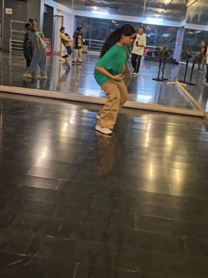 A student practicing moves during an SDDP training session. Every moment in the studio is a chance to get better.