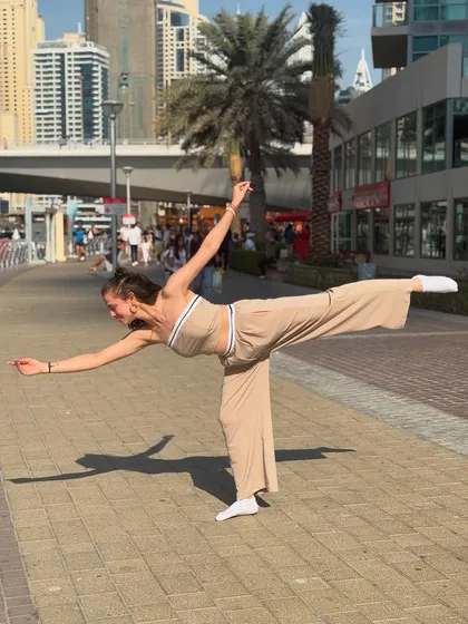 Grateful for the past and excited for the future. A dance pose on the streets of Dubai, a city with incredible energy.