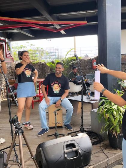 A candid shot of our team setting up and sound-checking before a show. A lot of work goes on behind the scenes to create the magic.