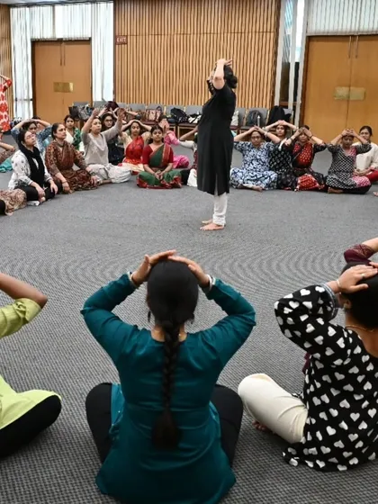 The workshop in session, with 70 participants immersed in a new form of dance and movement.