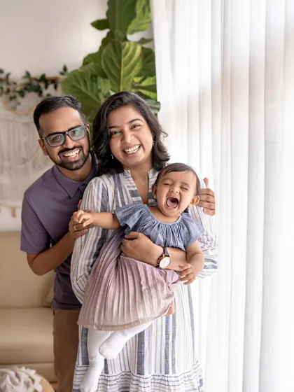 Happiness is seeing these smiles. A candid moment of pure joy and laughter from this lovely family.