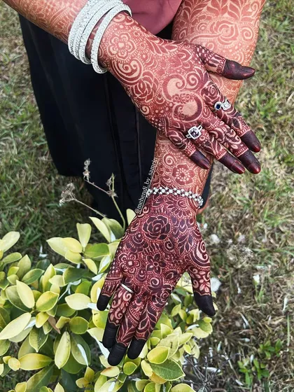 A close-up showing the intricate details of the stain. The fine lines and shaded portions of the design are all beautifully defined by the dark color.