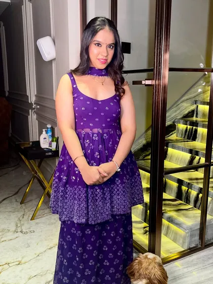 The full look, a lovely purple peplum top and sharara set, perfect for a guest.