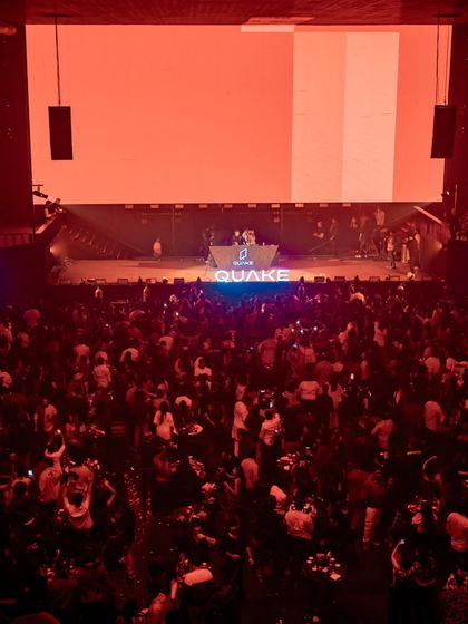 A high-angle shot showing the massive crowd that filled Quake Arena for its grand opening.
