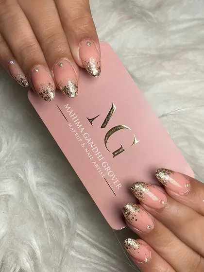 It is all in the details. A beautiful example of a sparkling glitter ombre nail extension, finished with delicate stonework for that extra touch of elegance. My nail art course teaches you how to create these stunning, durable designs from scratch.