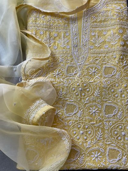 Another close-up of the detailed embroidery on the yellow silk chanderi.