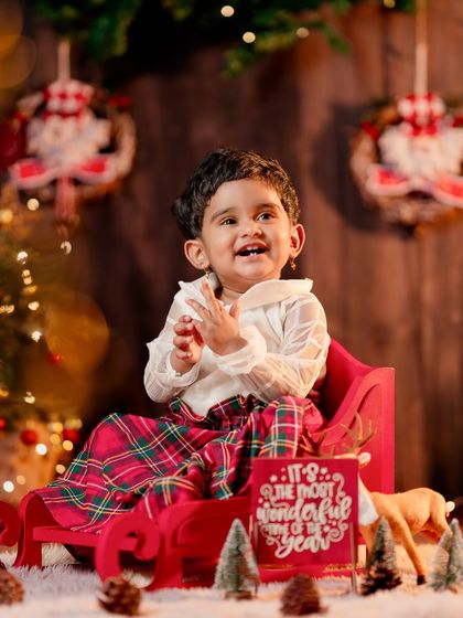 A beautiful, candid laugh captured during a fun and festive Christmas photoshoot.