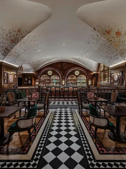 The vaulted ceiling and symmetrical layout create a grand, cathedral-like feel in the main space of the pub.