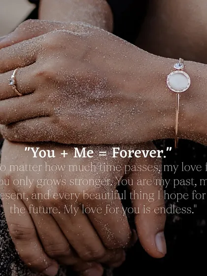An artistic shot focusing on the couple's hands, adorned with sand, and a beautiful quote overlay that enhances the emotional depth.