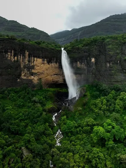 A closer look at Daityasur Waterfall. The contrast between the dark, wet rock and the vibrant green foliage is something I love to highlight in my aerial cinematography.