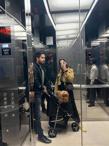 An elevator selfie with the whole family during our mall trip.