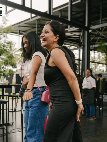 A mother and daughter sharing a laugh. My venue is a place for joy and connection.