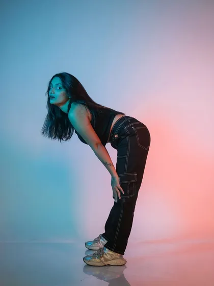 The final moment of the hair flip, with the model looking directly at the camera for a powerful connection.