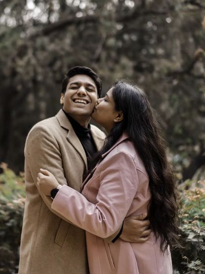 A candid moment of laughter during a walk in the park. The genuine joy on his face is a testament to their easy, happy connection.