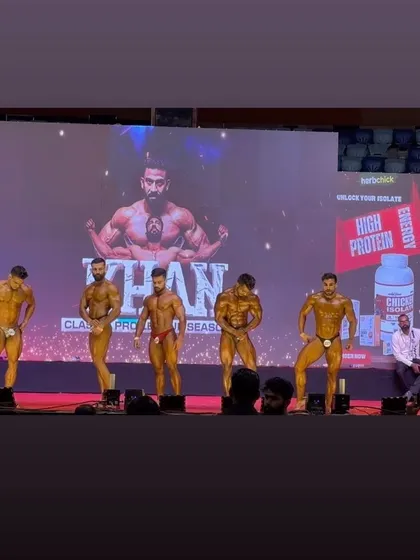 A lineup of champions at the Khan Classic. You can see the level of conditioning and muscle maturity my athletes bring to the stage. We train to stand out and make an impact from the moment the lights hit.