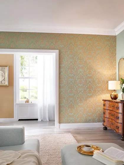 A two-toned damask pattern in earthy green and gold. This design from the Trianon collection adds a touch of vintage charm and warmth to this eclectic living space.