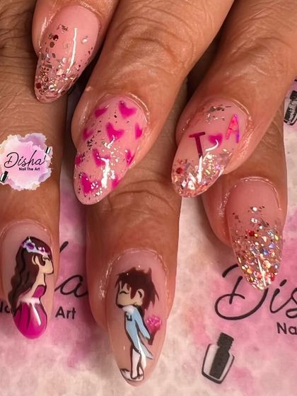 A cute and romantic Valentine's design. I hand-painted this adorable couple and paired them with glitter and heart-themed nails.