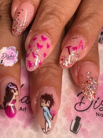 A cute and romantic Valentine's design. I hand-painted this adorable couple and paired them with glitter and heart-themed nails.