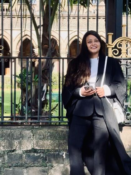 A simple smile can conquer the world. A happy moment outside the Bombay High Court, feeling positive and ready for what's next.