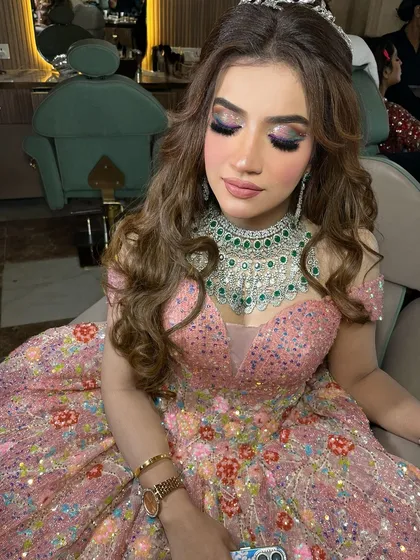A close-up of the makeup, featuring a colorful, shimmery eye look.