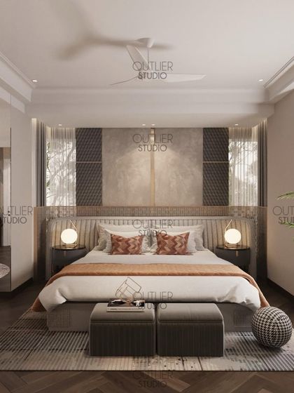 This master suite will make you want to stay in bed all day. The design features a textured headboard wall, simple globe bedside lamps, and a neutral color palette for a calm and serene atmosphere.