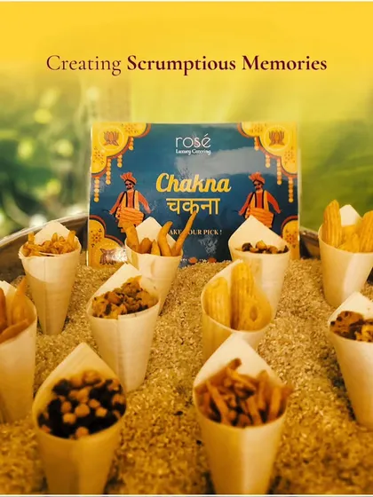 Our "Chakna" station offers a gourmet twist on traditional Indian bar snacks. Served in individual paper cones, these savory bites are the perfect accompaniment to drinks at a cocktail party.