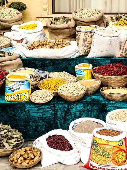 A detailed shot of the spice market setup, with sacks and baskets of various Indian spices. This not only looked great but also added an aromatic element to the event.