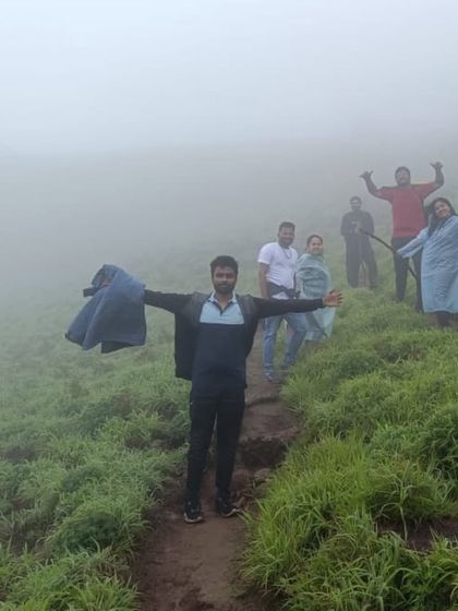Trekkers enjoying the foggy and drizzly weather on the trail. A little rain doesn't stop our adventure.