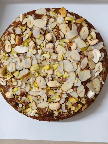 This is my Whole Wheat Jaggery Cake, and it's pure indulgence without the guilt. It's loaded with a generous amount of mixed nuts like almonds and pistachios, making it a perfect diabetic-friendly treat.