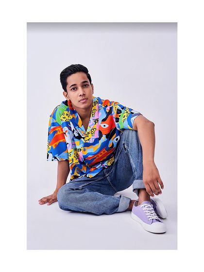 A second look for the same model's portfolio. I chose a colorful, graphic print shirt and lilac sneakers to create a vibrant, summery look that shows a different, more playful side.