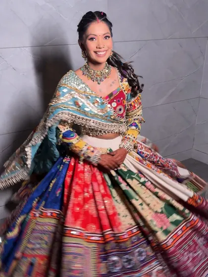 Another dynamic shot of her Navratri look, showing how the makeup and hair hold up beautifully during a dance.