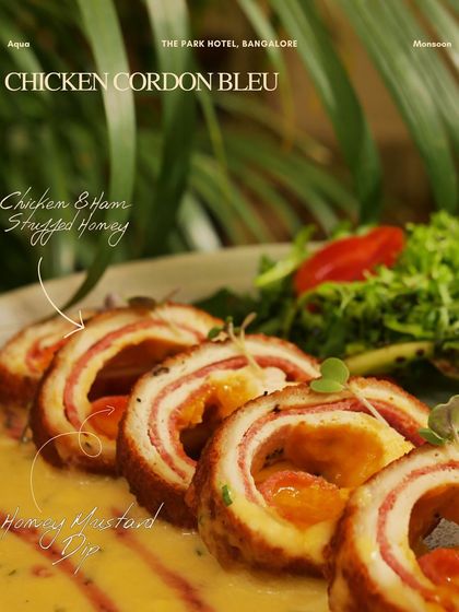 Chicken Cordon Bleu, elegantly sliced and served with a creamy honey mustard dip. A classic European dish perfected by my chefs.