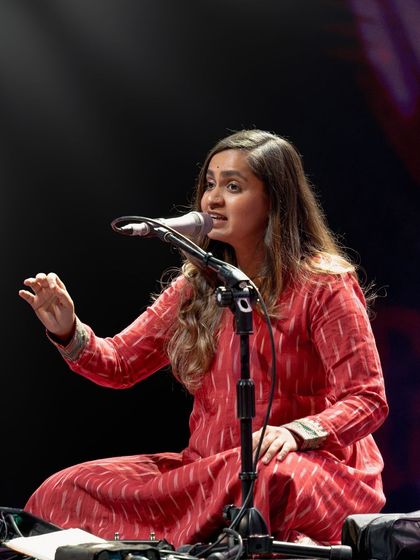 A seated performance at the Mahindra Percussion festival. This setting allows for a deep dive into the intricate rhythms and melodies of Indian classical and fusion music.