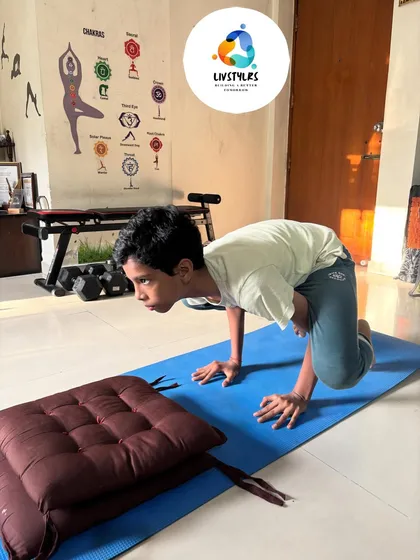 It is amazing to see what young bodies can achieve with focus and practice. This young client is mastering Bakasana (Crow Pose), building incredible arm strength, core stability, and concentration.